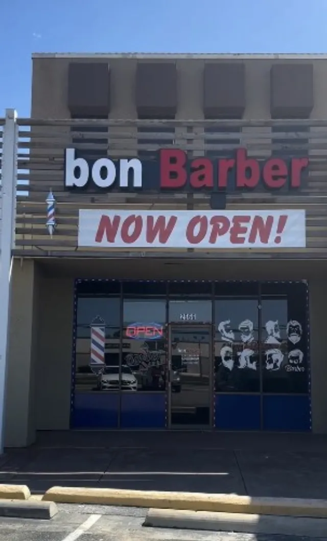 Bon Barber storefront on Royal Lane with red Now Open banner and barber pole